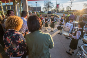 Queen City Juvenile Pipes And Drums perform while patrons watch at Jekyll & Hyde Taphouse in Matthews as a part of their official opening celebration.